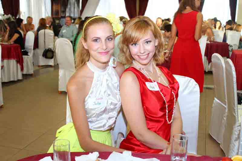 Two beautiful Ukraine women posing for a photo