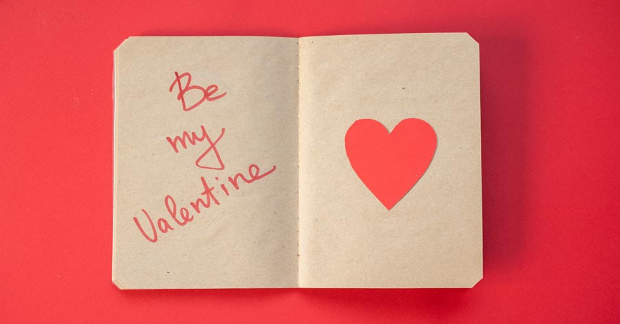 Paper notebook with Be my Valentine inscription